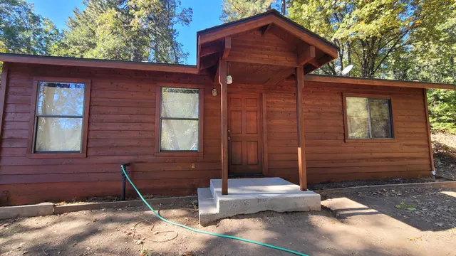 Log Homes & Staining by Michael Hines Painting